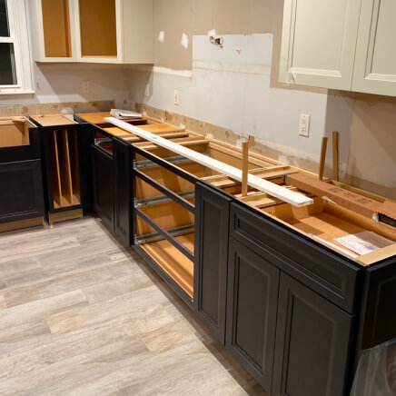 img - residential-kitchen-construction-being-renovated-new-cabinets-floors