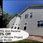 A white two-story house exterior with large windows is shown alongside a Homestead Exteriors Denver, CO logo and a 5% off offer for siding or window projects over $5,000.